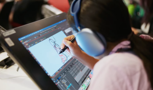 A pre-college student works on a digital animation project